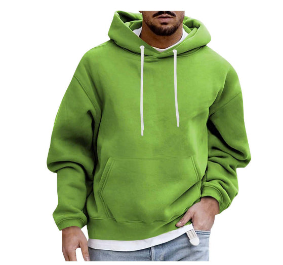 Green hoodie worn by a person on a white background