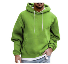 Green hoodie worn by a person on a white background